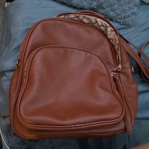 Moda Luxe brown three pocket backpack